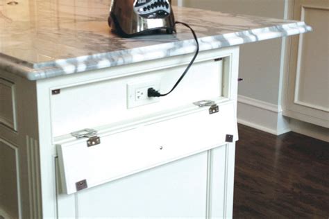 how to hide kitchen counter plugs